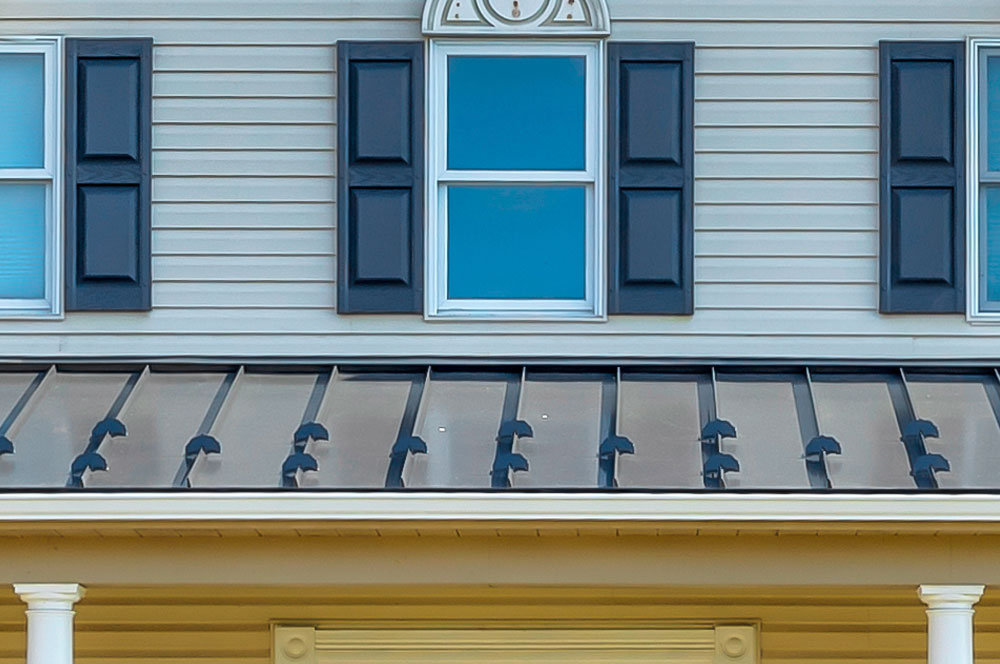 StandingSeamMetalRoof2 and siding with window shutters